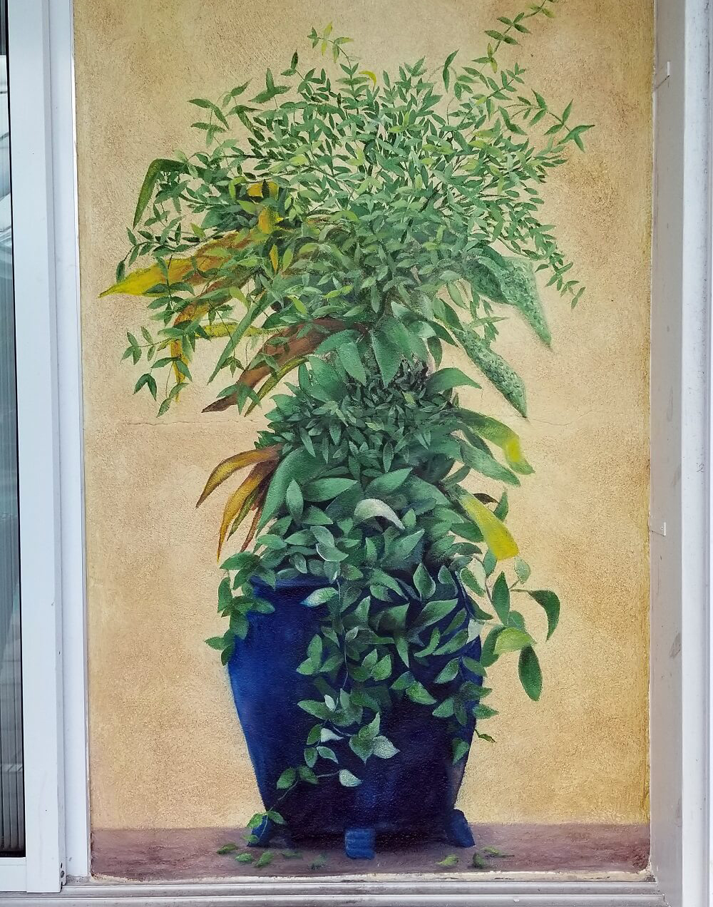 A Green Branches in a Blue Color Vase Painting