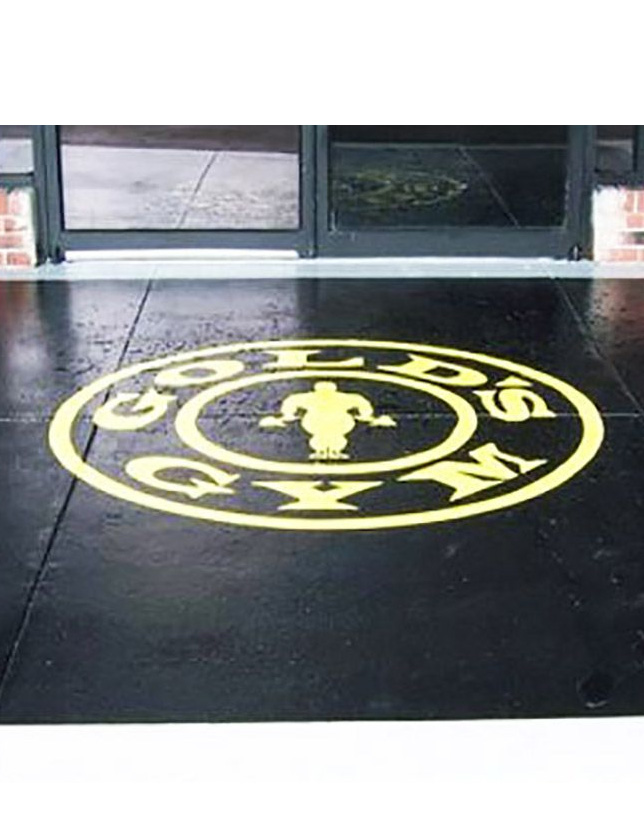 Yellow Color Gold Gym Painted Logo on Black Floor